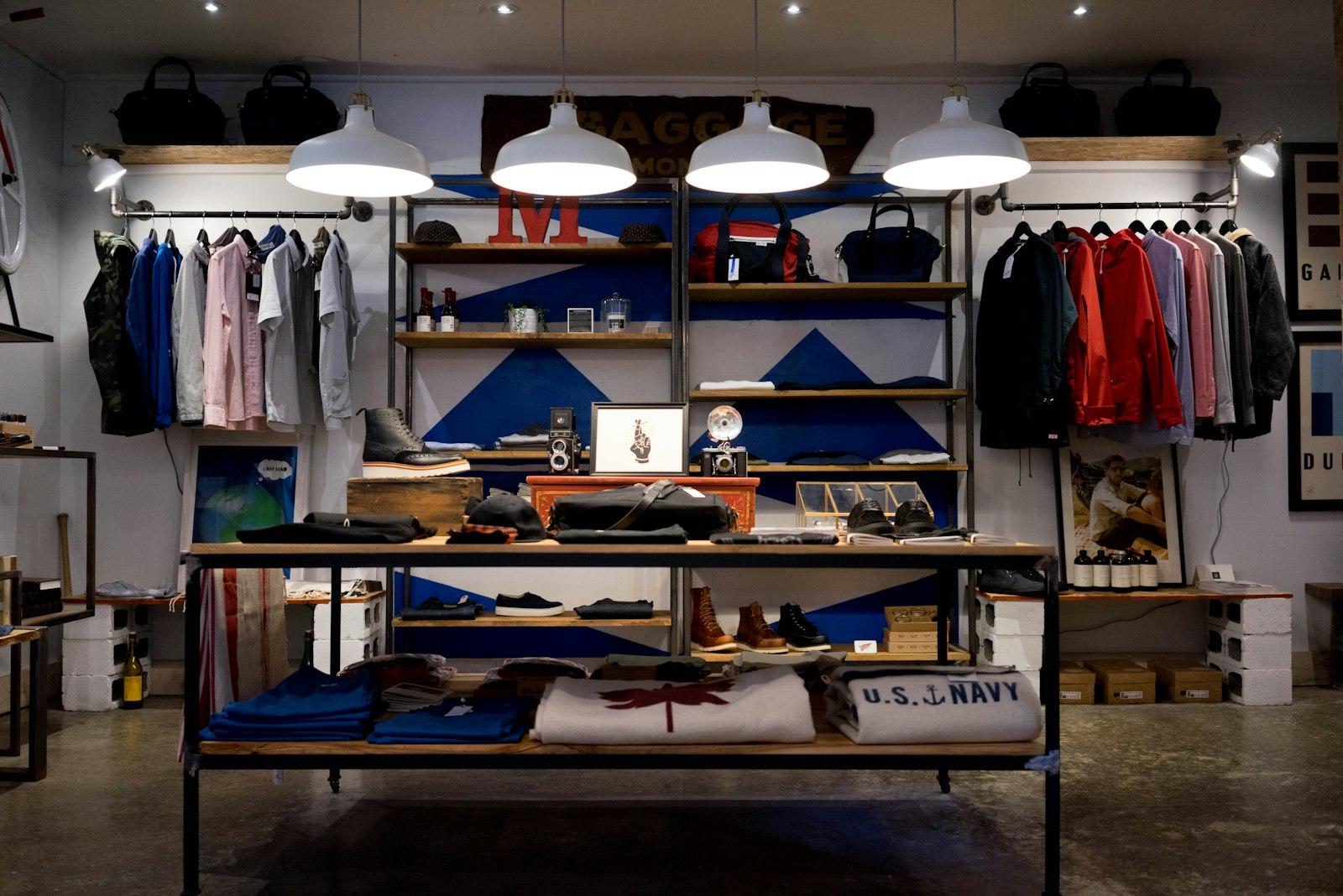 Fashion clothing and bags on display